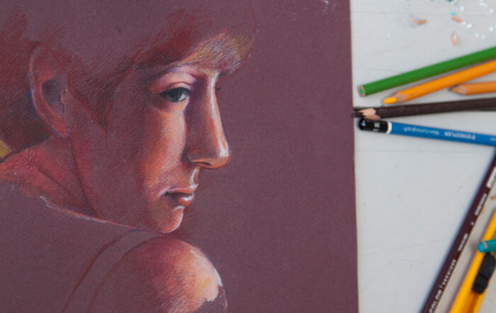 Portrait drawn with colored pencils.