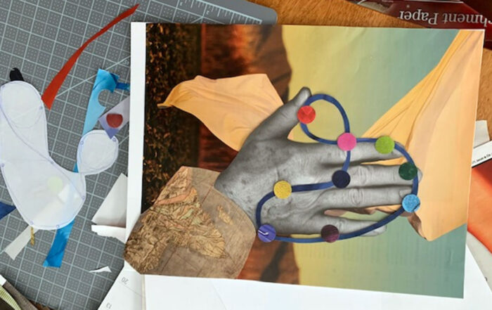 A collage of a person's hand sits next to collage papers and materials.